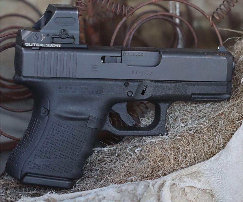 Outerimpact Micro Red Dot Kurzwaffen Adapter auf Glock montiert.